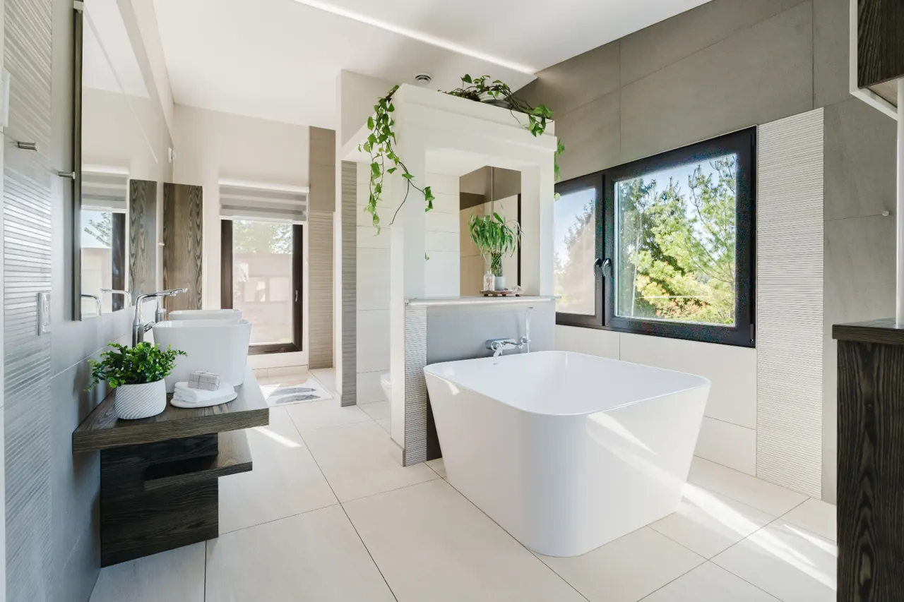 Bathroom with a freestanding tub, vessel sinks and large windows — GCO work in Ottawa