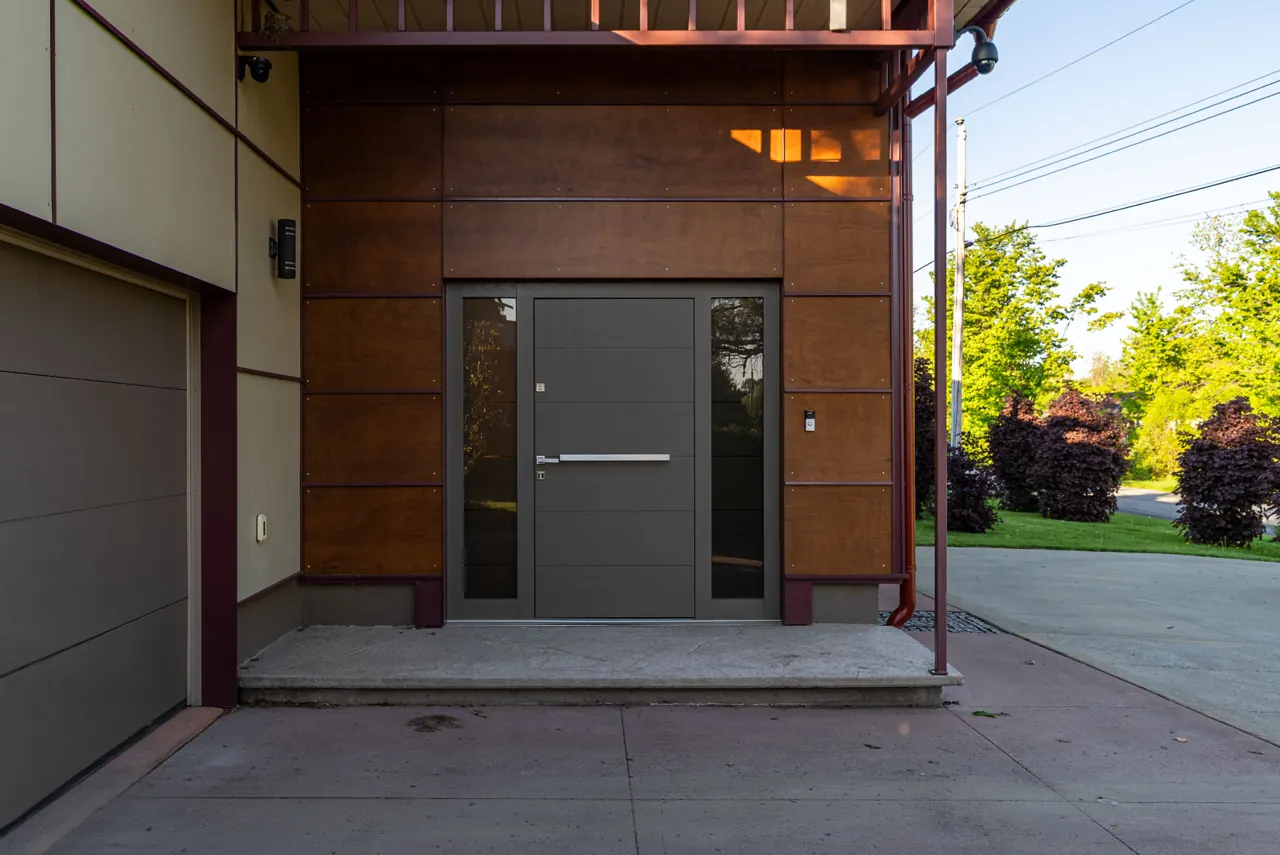 Exterior entrance with wood cladding and glazed sidelights — GCO work in Ottawa